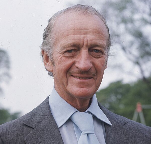 David Niven's eyes color - blue and hair color - brown David Niven's eyes and hair color