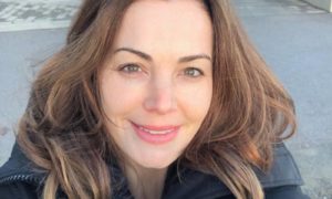 Erica Durance's eyes and hair color